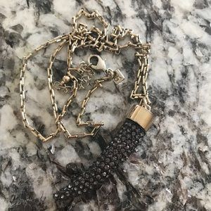 Crystal tiger tooth pendant